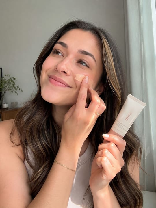 Creators showing skincare and complexion products to camera